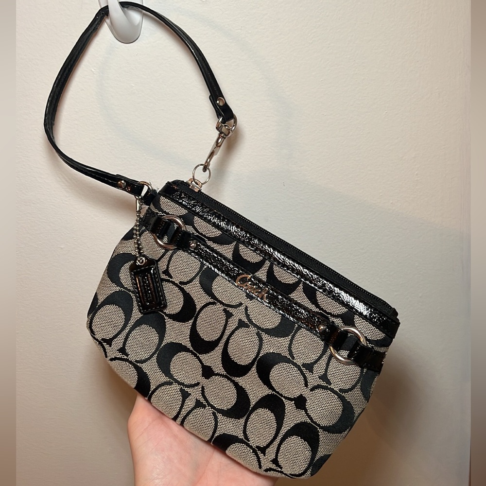 Coach signature monogram wristlet